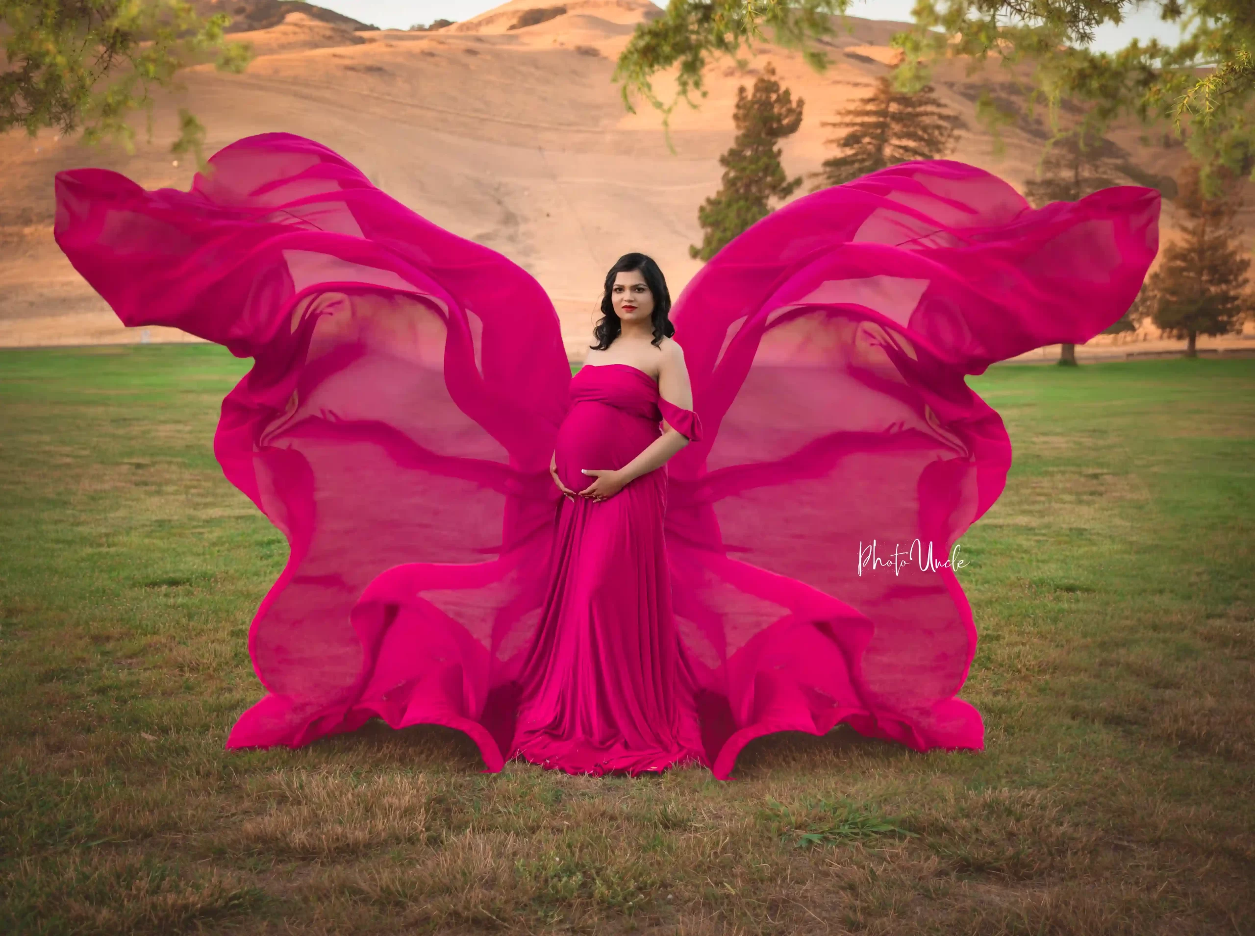 Glamorous Glow: Hot Pink Off-Shoulder Maternity Dress with Stunning Train